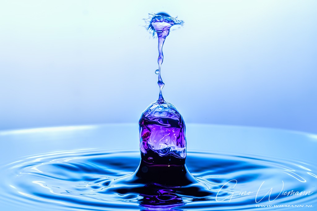 Splash on glass droplet